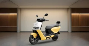 Ather Rizta electric scooter displayed in a modern indoor showroom with clean tile flooring and subtle spotlighting